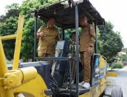 Bupati Asahan Letakkan Batu Pertama Pembangunan Jalan Penghubung 2 Desa di Kecamatan Bandar Pulau
