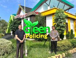 Dukung Program Green Policing, Polsek Bonai Darussalam Bersama Warga Desa Sontang Pasang Neon Box dan Tanam Pohon